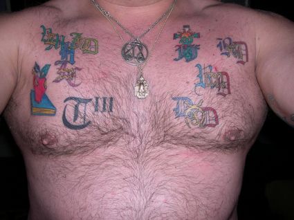 Multi Tats On Chest